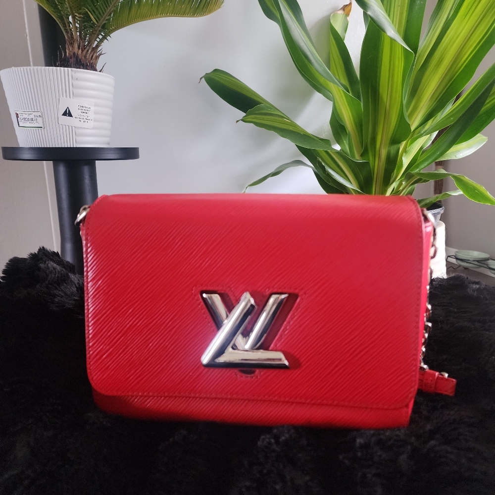 Authentic Louis Vuitton Red Epi Leather twisted bag